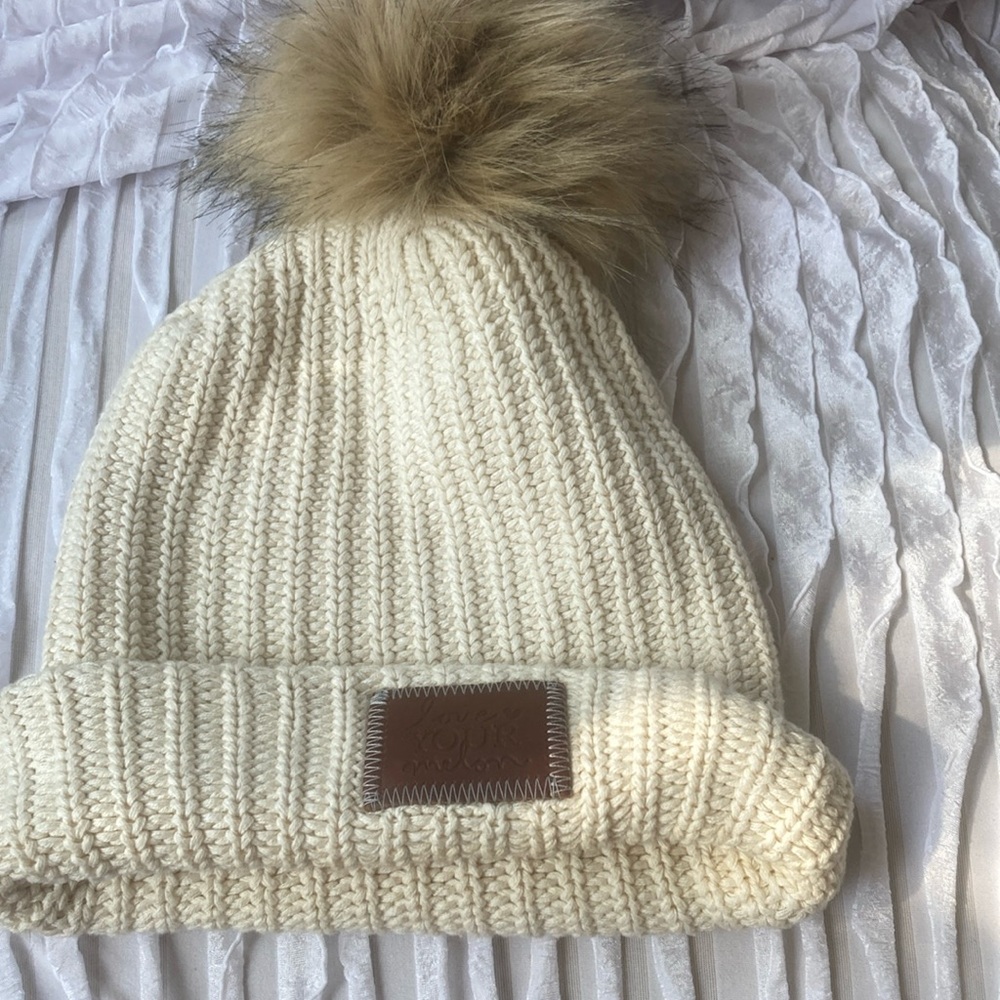 Love your melon cream, colored winter beanie hat with Pom Pom